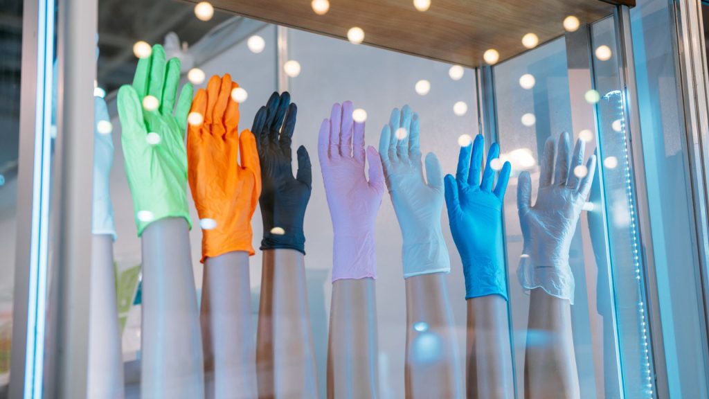 HPPES - display case shows colorful nitrile gloves - what matters more than flashy sales when evaluating nitrile glove suppliers
