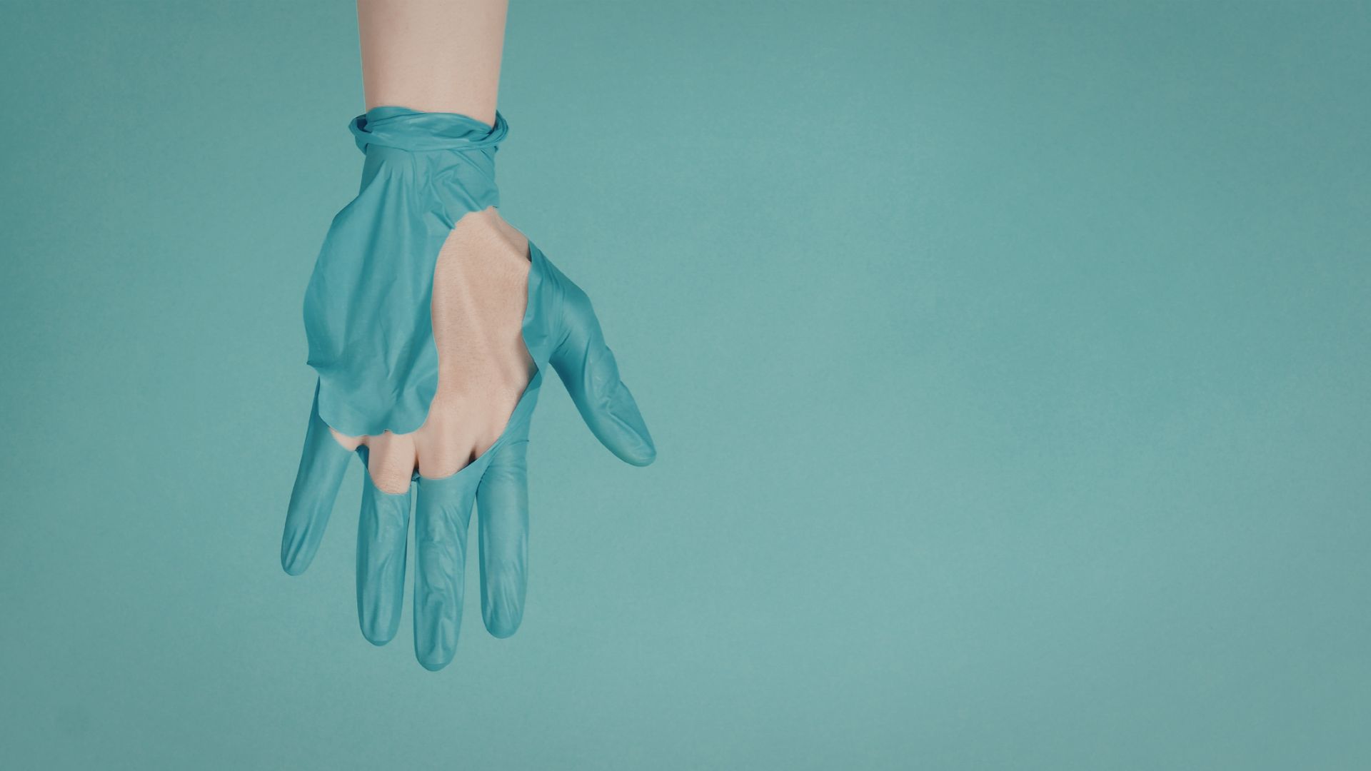HPPES - torn medical glove - quality assurance in evaluating nitrile glove suppliers